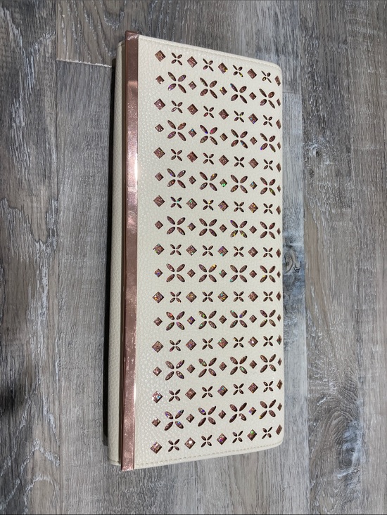 Charming Charlie Handbags - Charming Charlie Cream Clutch with Rose Gold Trim